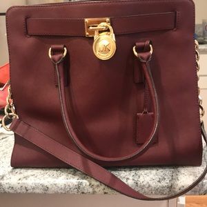 Micheal Kors wine color satchel